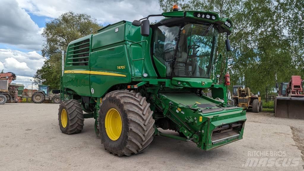 John Deere T 670 i Зернозбиральні комбайни