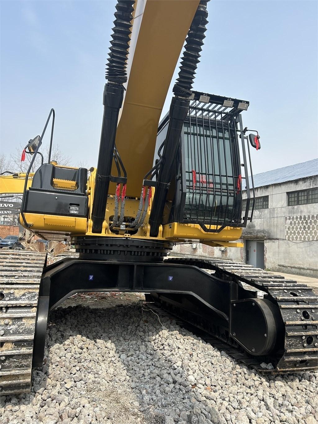 CAT 340 Гусеничні екскаватори