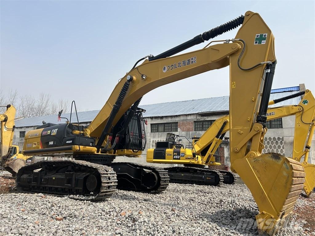 CAT 340 Гусеничні екскаватори