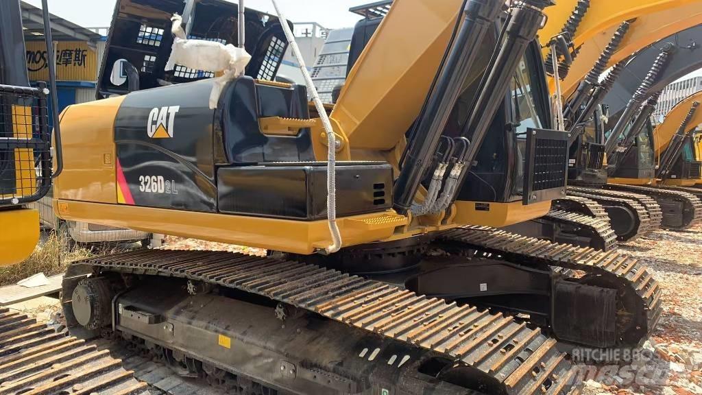 CAT 326 Гусеничні екскаватори