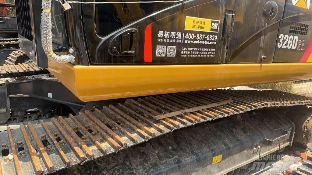 CAT 326 Гусеничні екскаватори
