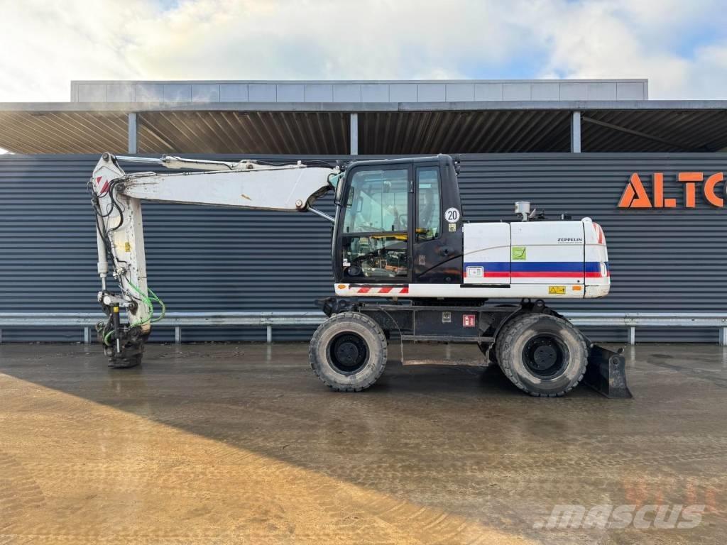 CAT M315D Колісні екскаватори