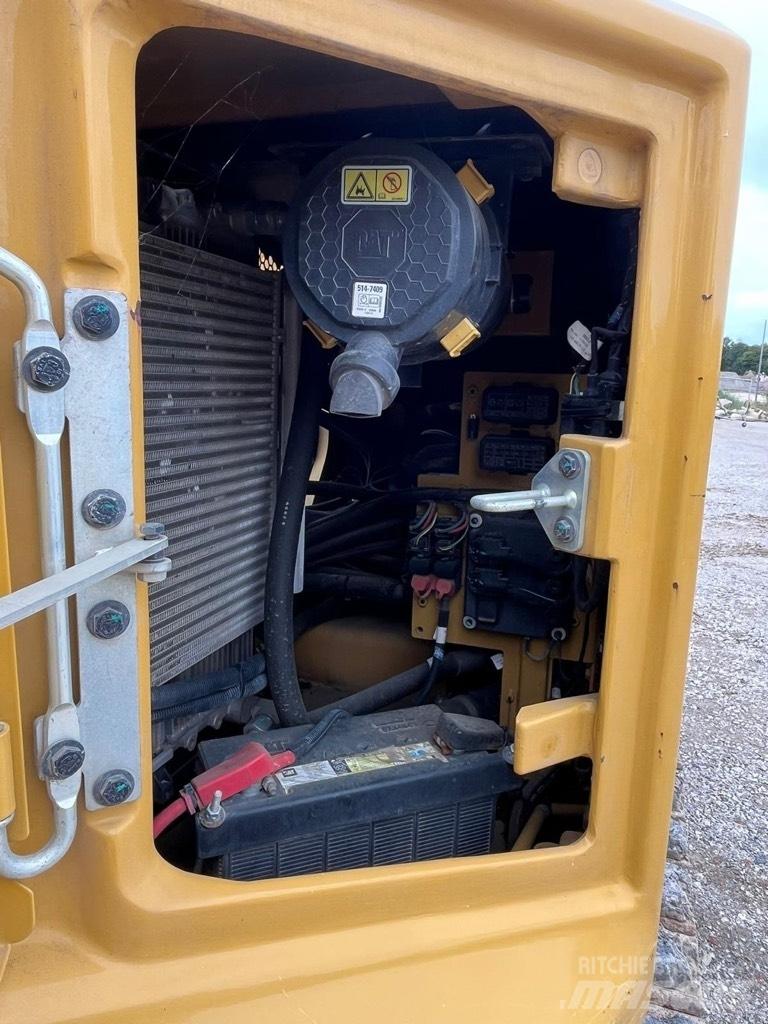 CAT 310 Середні екскаватори 7т. - 12т.