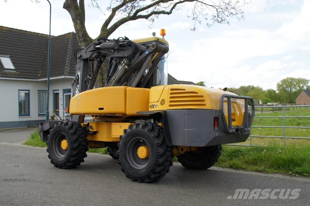 Mecalac 12 MXT Колісні екскаватори