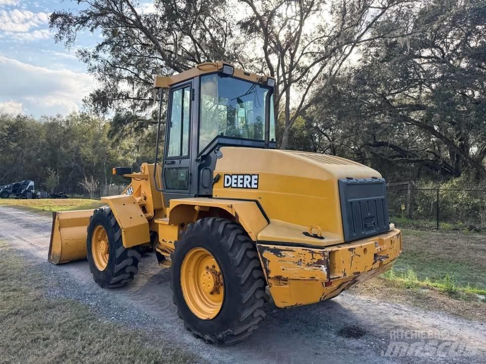 John Deere 324h Фронтальні навантажувачі