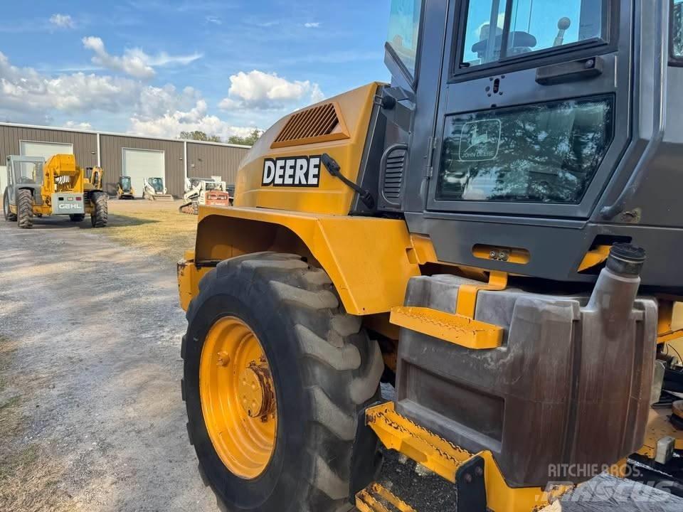 John Deere 324h Фронтальні навантажувачі