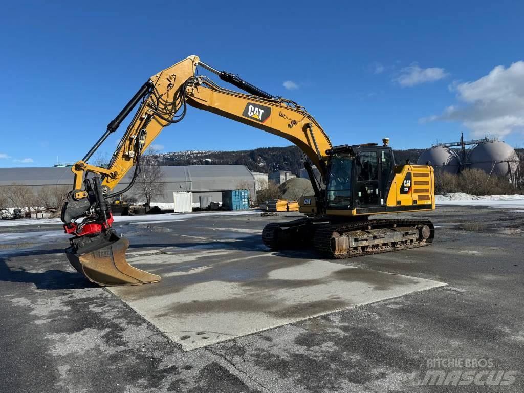 CAT 323 NG Гусеничні екскаватори