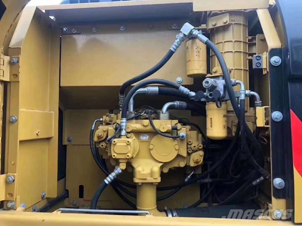 CAT 323 Гусеничні екскаватори