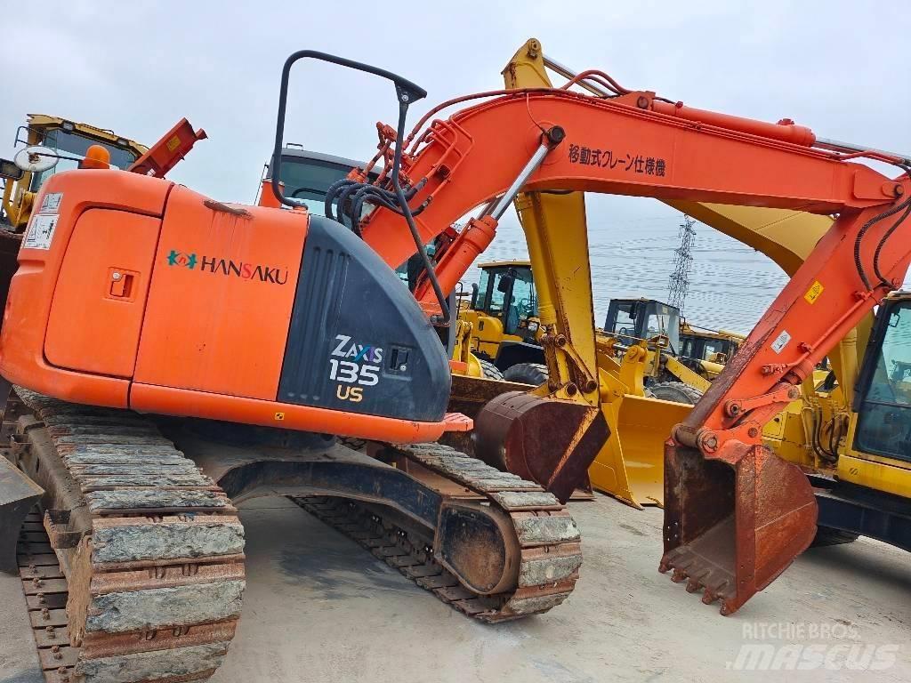 Hitachi ZX 135 US Гусеничні екскаватори
