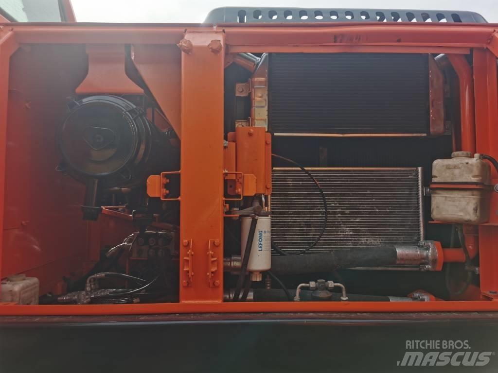 Doosan DX 225 LC-9C Гусеничні екскаватори