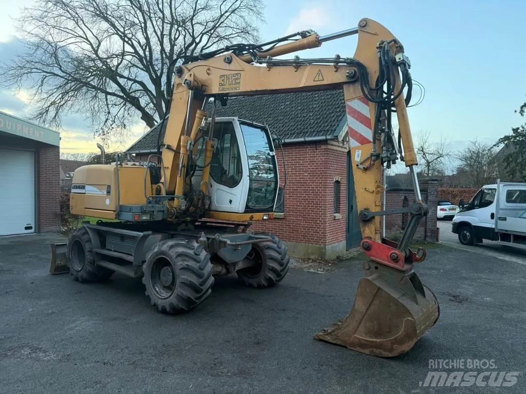Liebherr A312 Колісні екскаватори