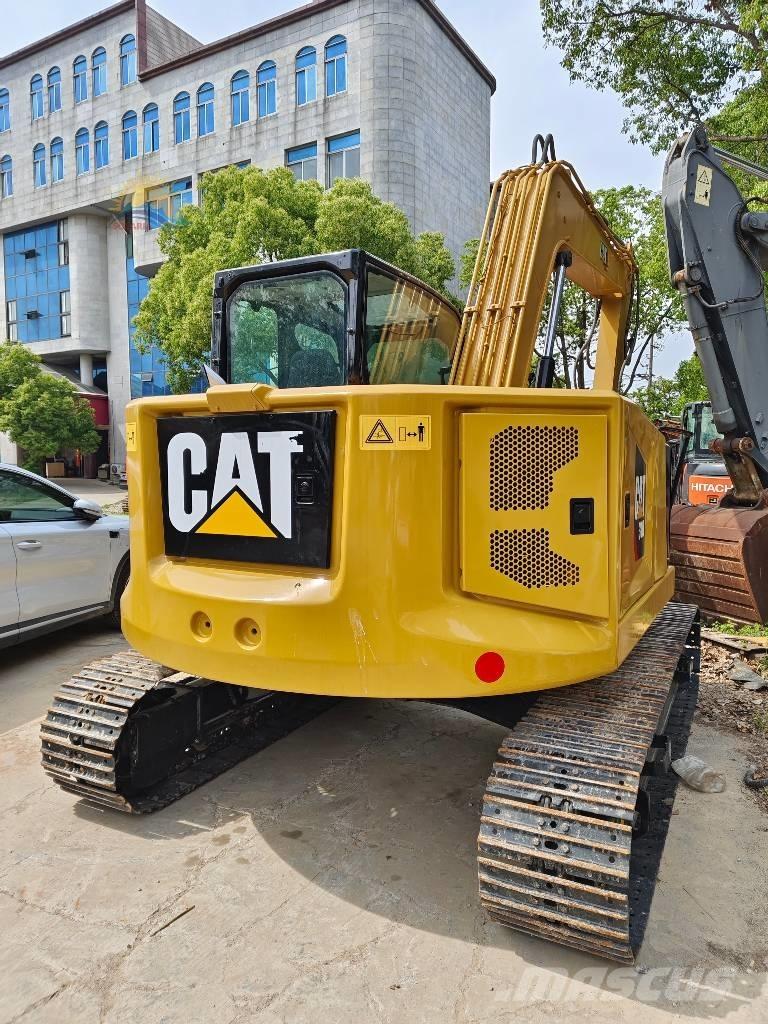 CAT 310 Гусеничні екскаватори