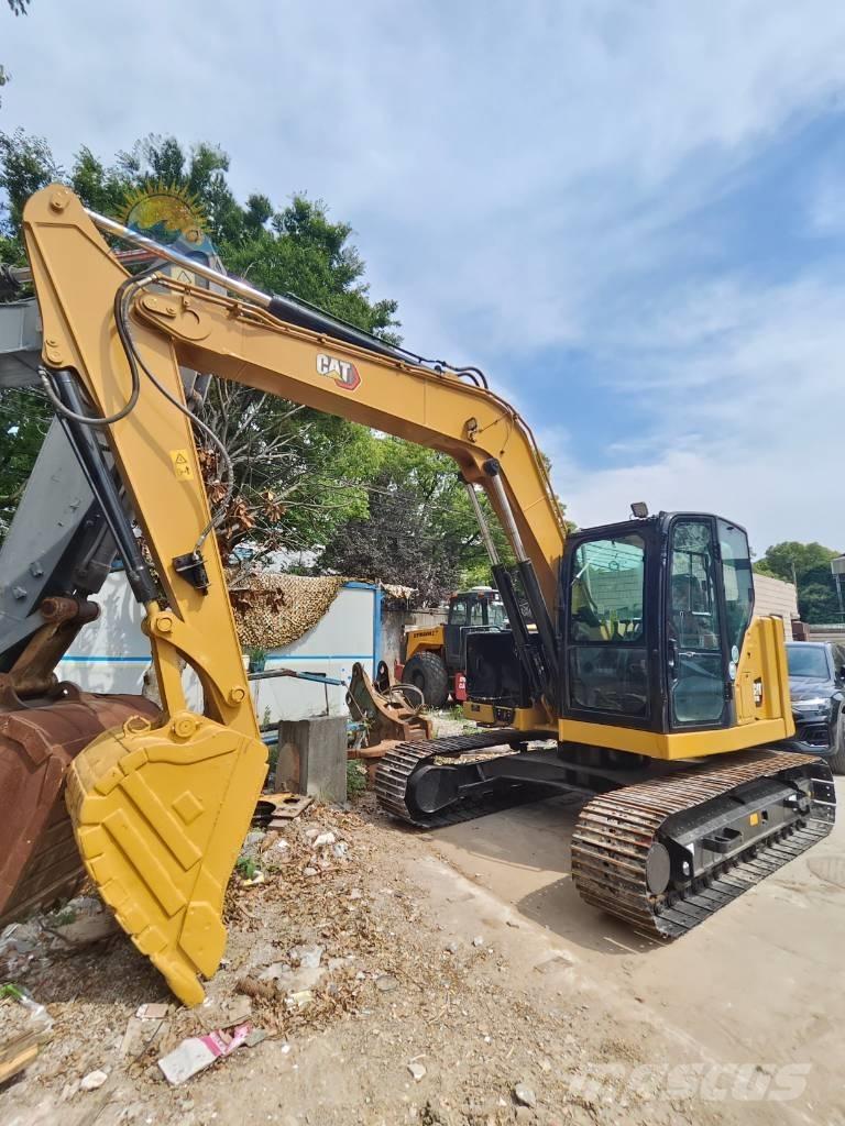 CAT 310 Гусеничні екскаватори