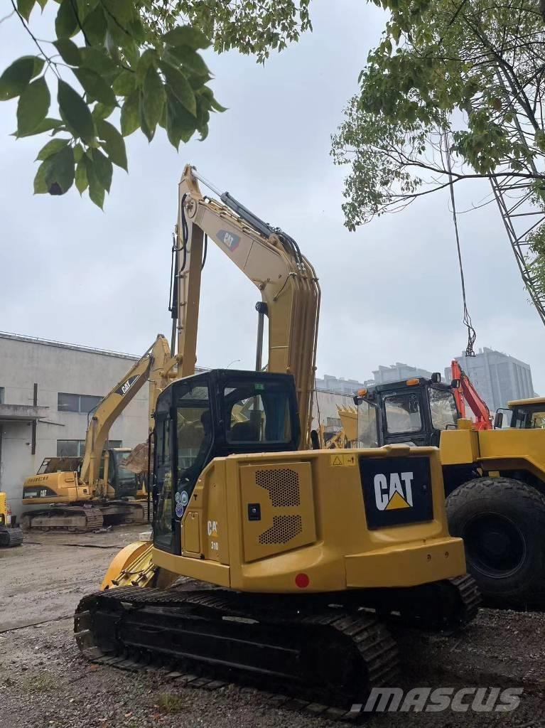 CAT 310 Гусеничні екскаватори