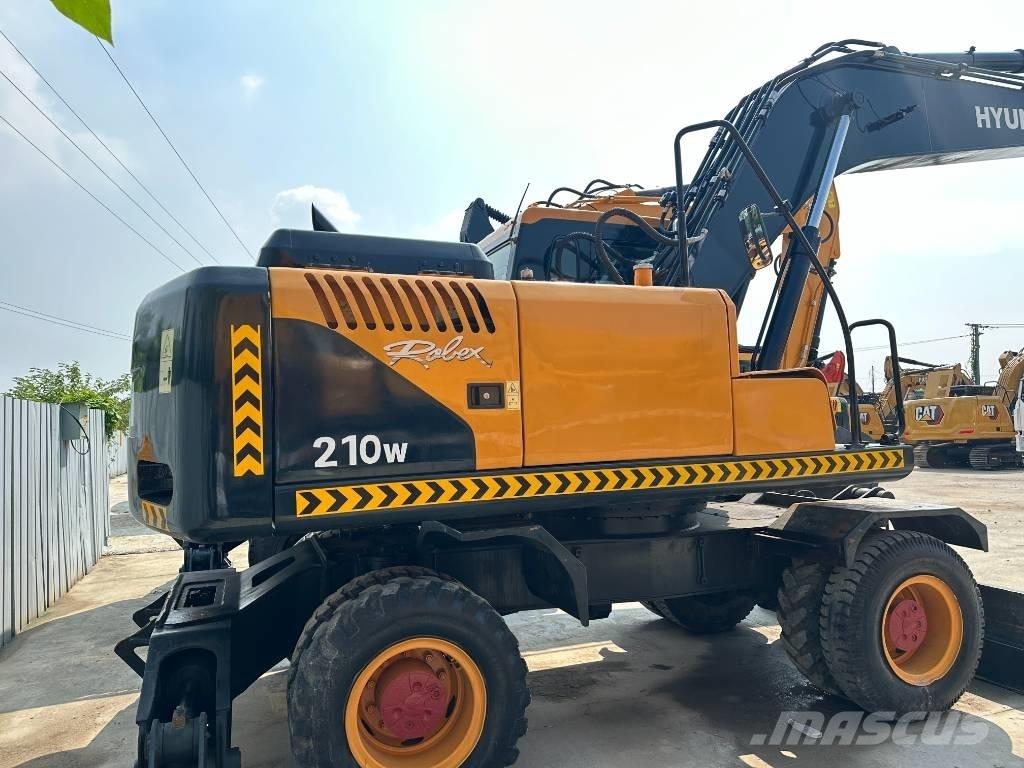 Hyundai 210W-9 Колісні екскаватори