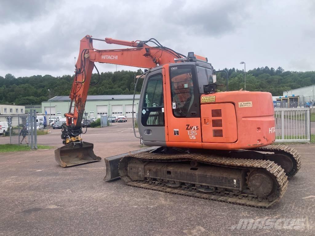 Hitachi ZX 135 US Гусеничні екскаватори