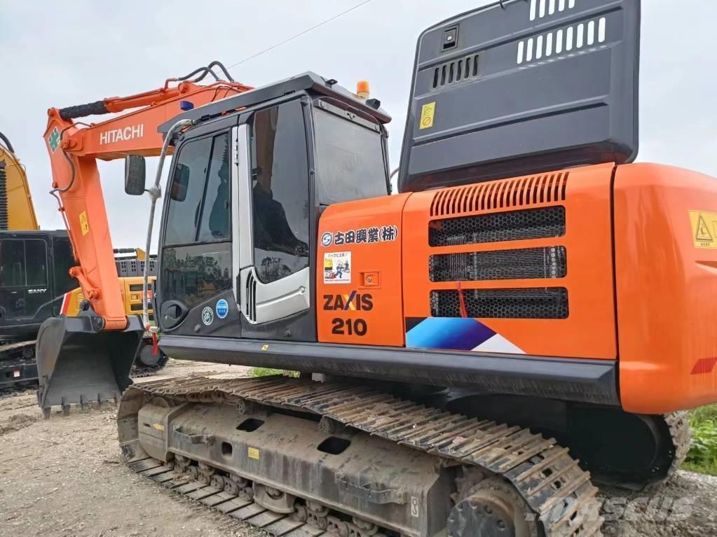 Hitachi ZX210 Гусеничні екскаватори
