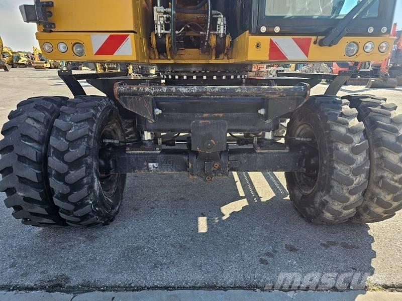 CAT M320F Колісні екскаватори