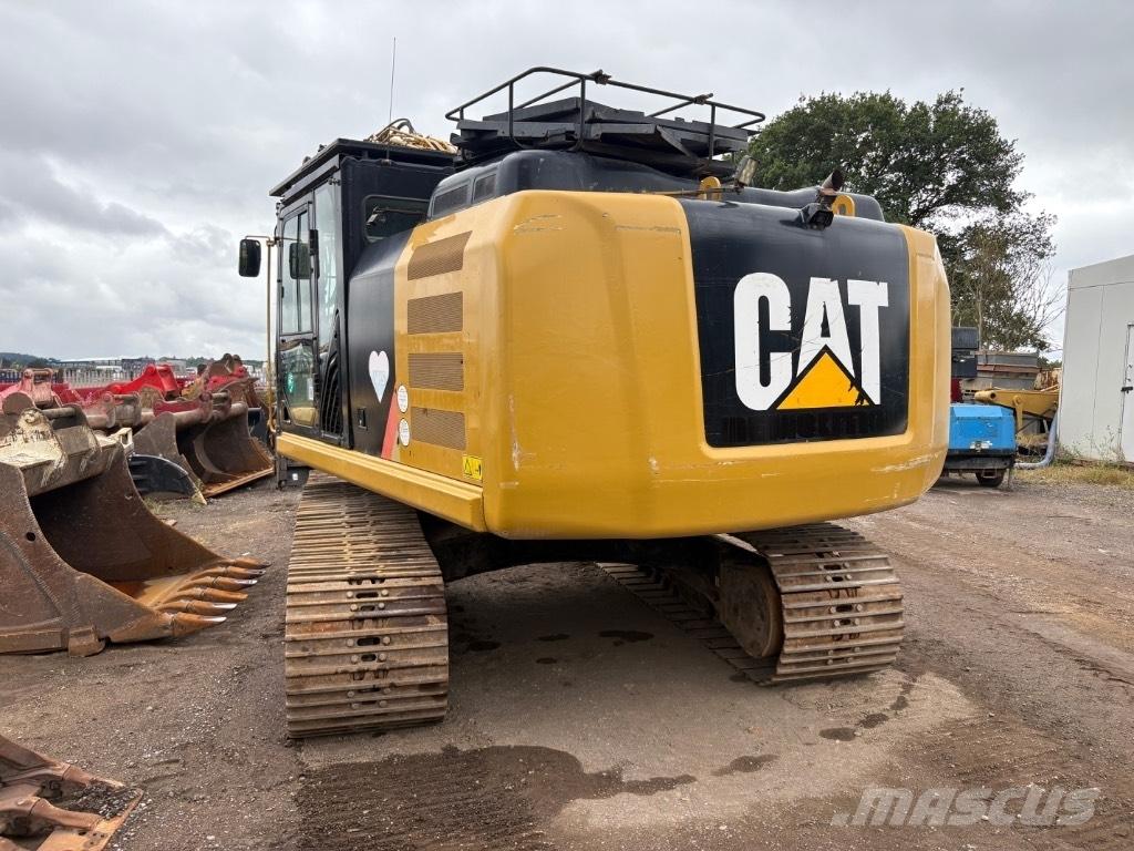 CAT 323 F L Гусеничні екскаватори