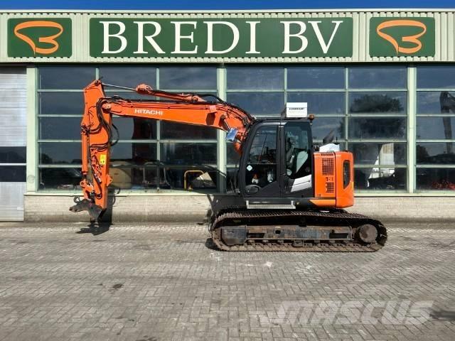 Hitachi ZX 135 US-6 Гусеничні екскаватори