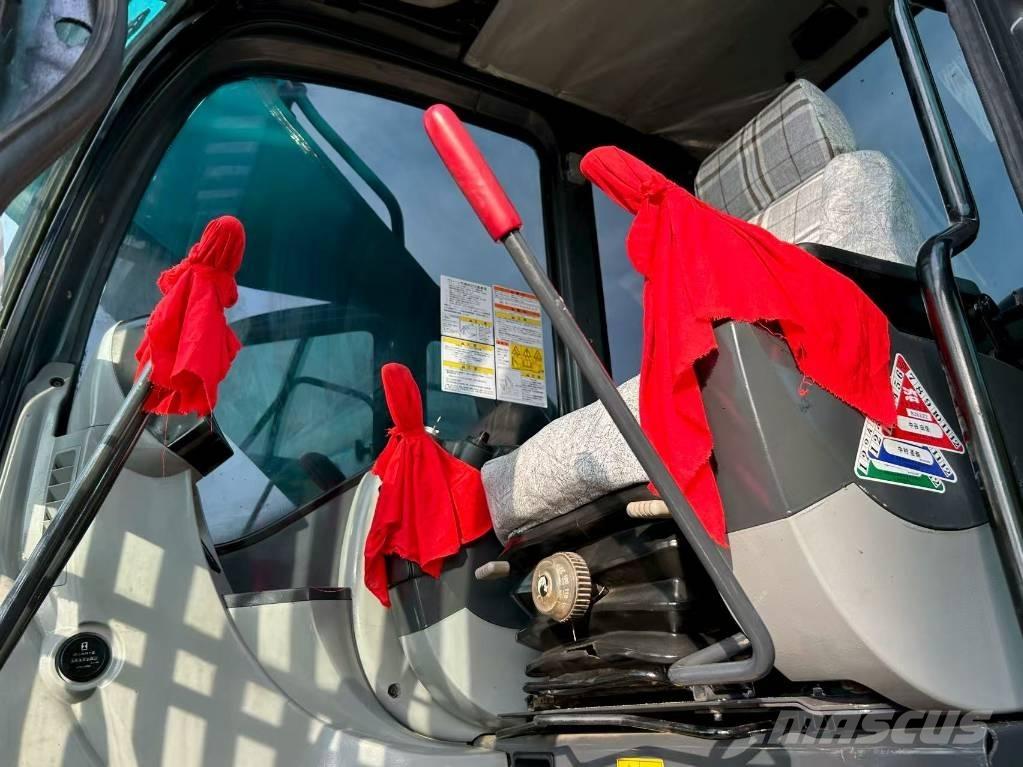 Kobelco 350 Гусеничні екскаватори