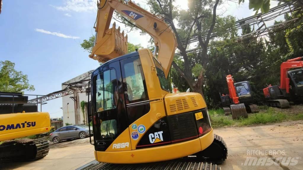 CAT 308 C Середні екскаватори 7т. - 12т.