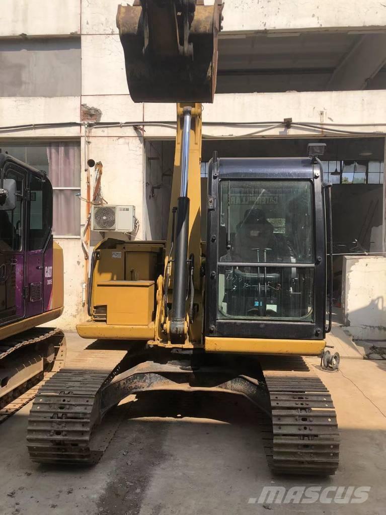 CAT 307 E Гусеничні екскаватори