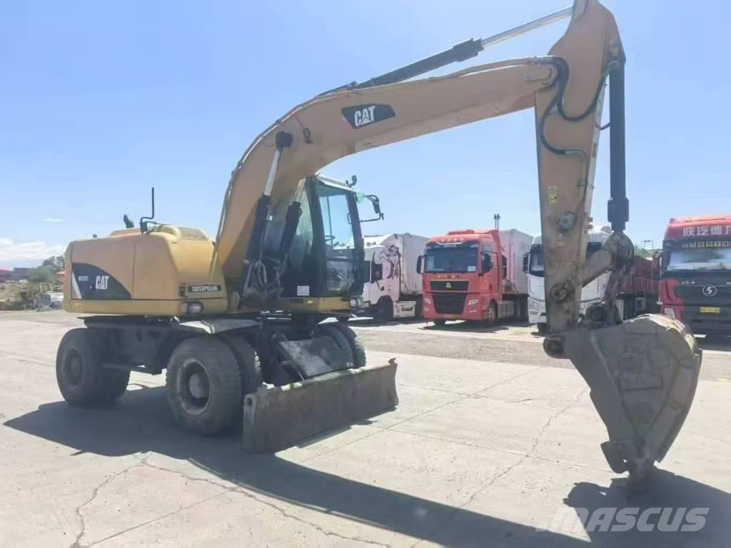 CAT M315D2 Колісні екскаватори
