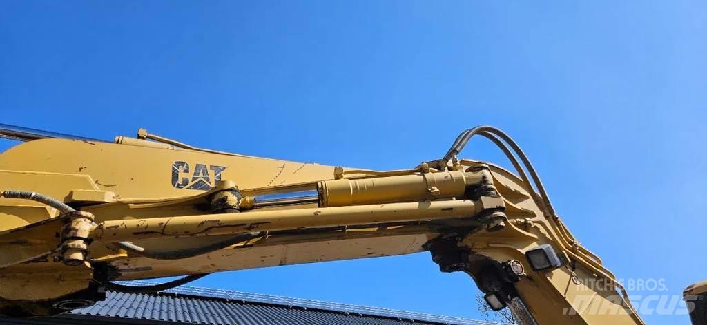 CAT E 70 B Середні екскаватори 7т. - 12т.