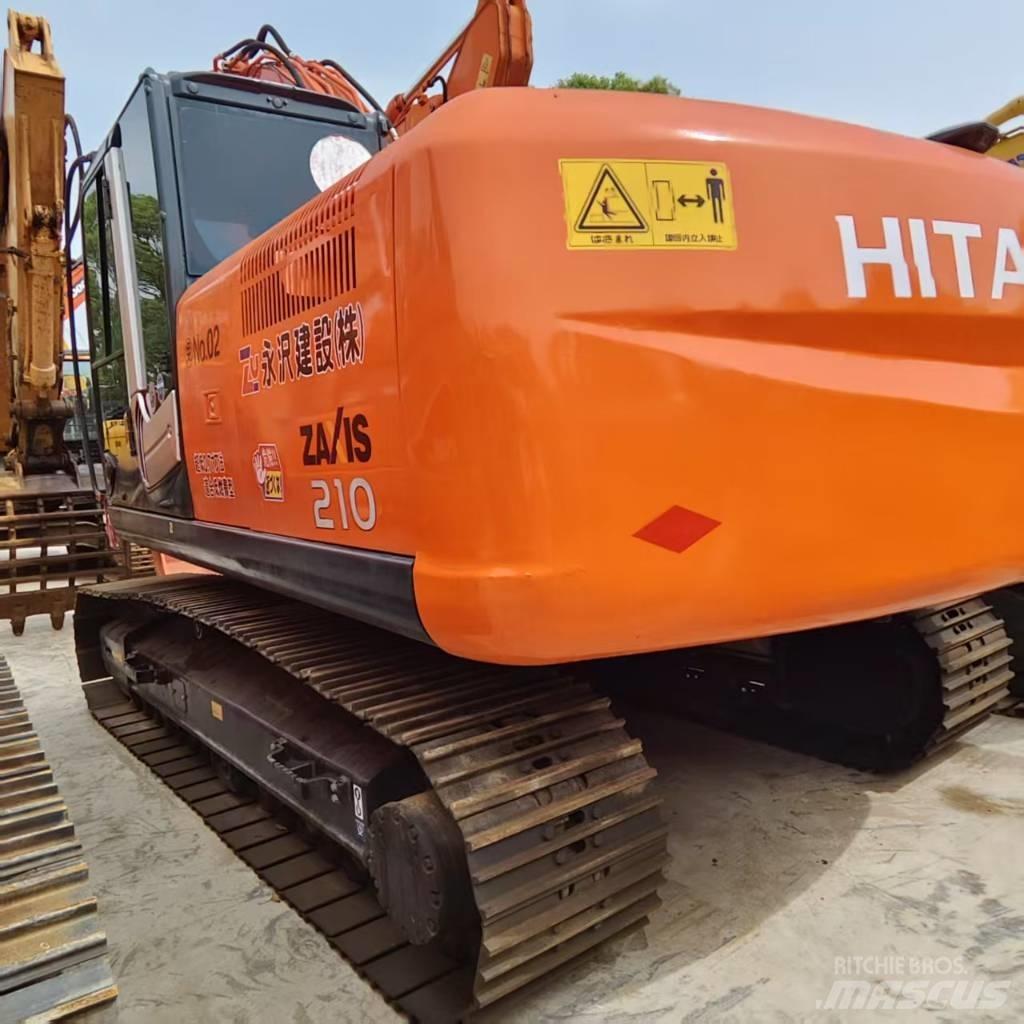 Hitachi ZX 210 Гусеничні екскаватори