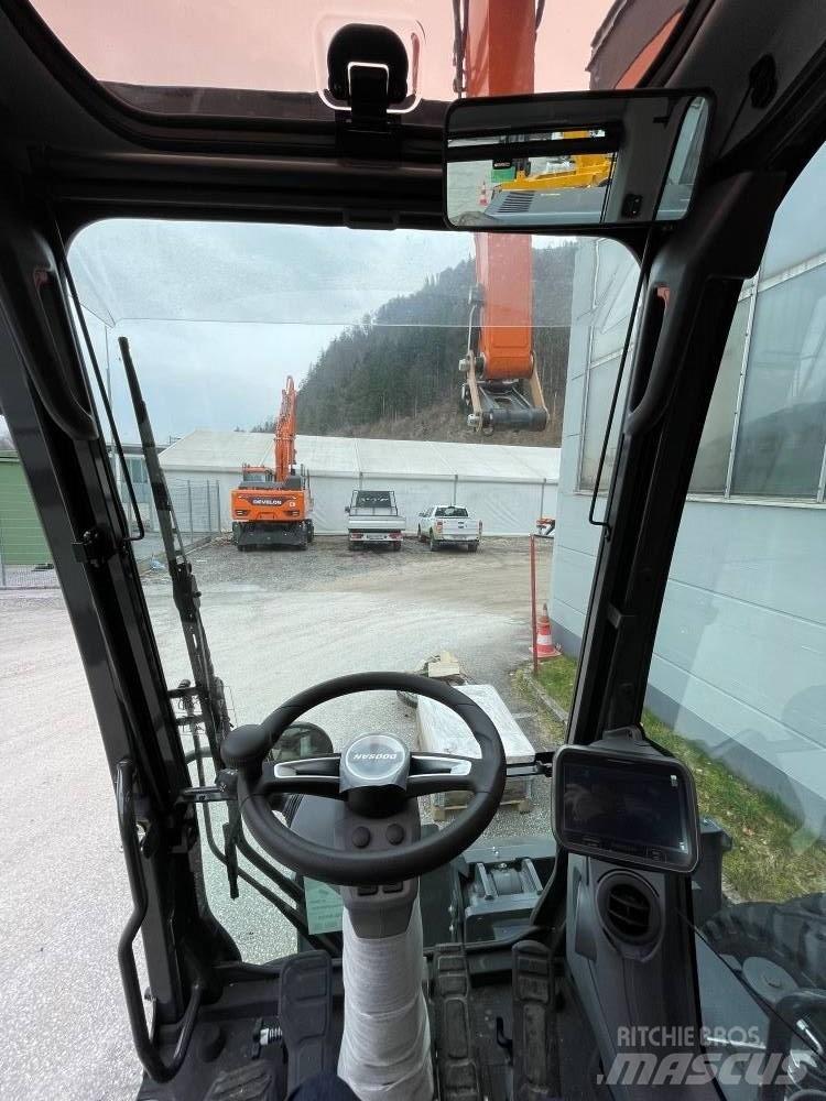 Develon DX 210 W-7 Екскаватори