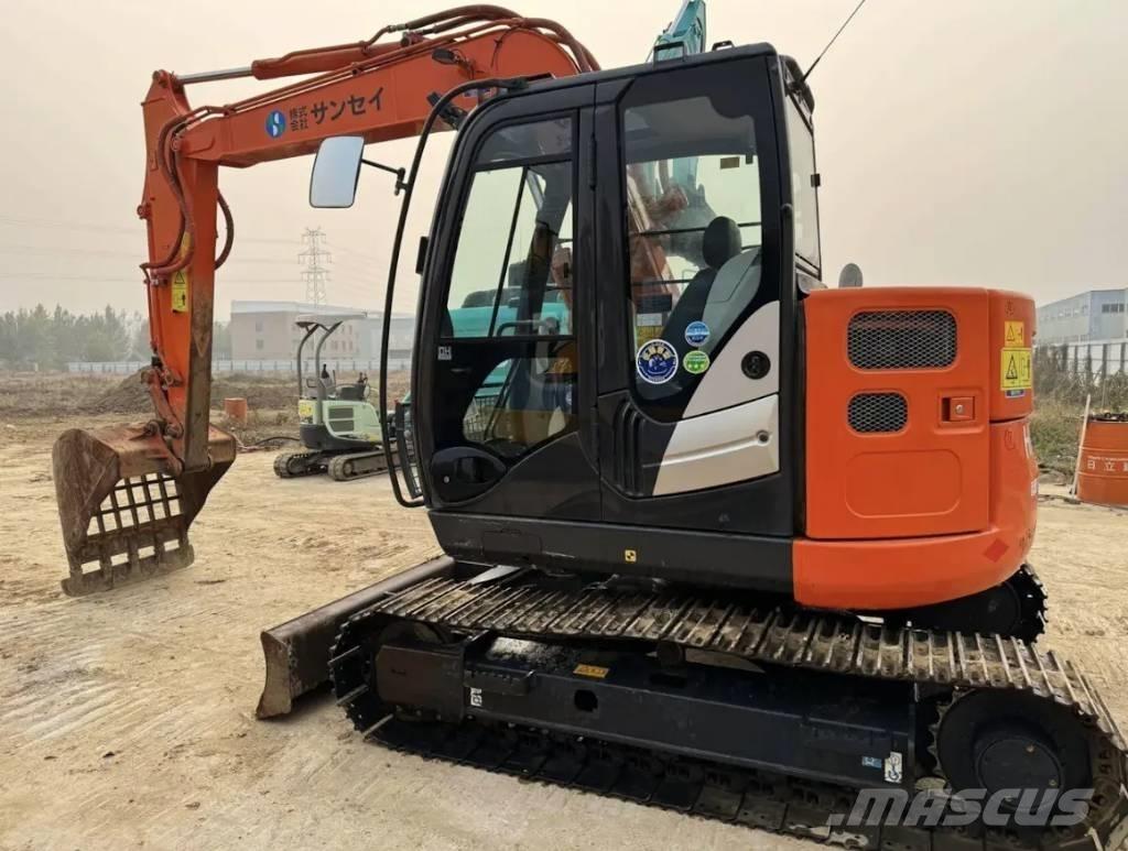 Hitachi ZX 75 US Середні екскаватори 7т. - 12т.
