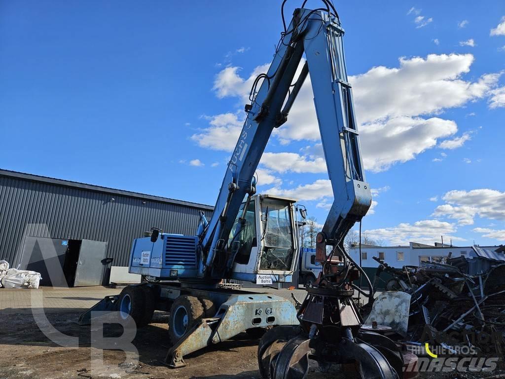 Fuchs MHL 320 Колісні екскаватори