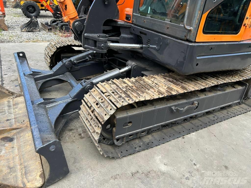 Doosan DX 80 R Середні екскаватори 7т. - 12т.