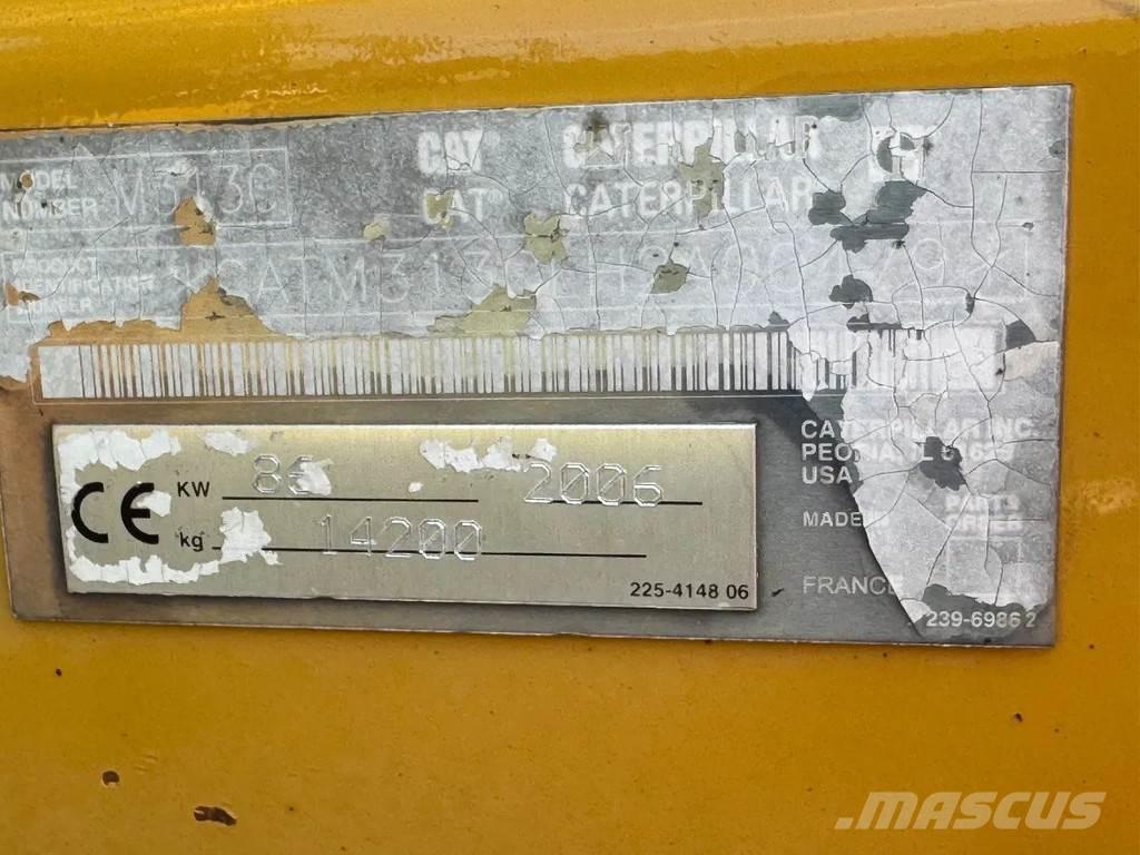 CAT M313C Колісні екскаватори