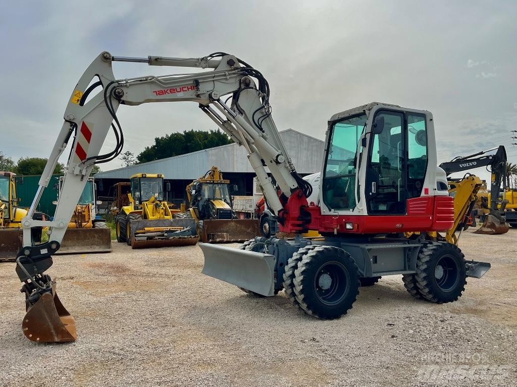 Takeuchi TB 295 Колісні екскаватори