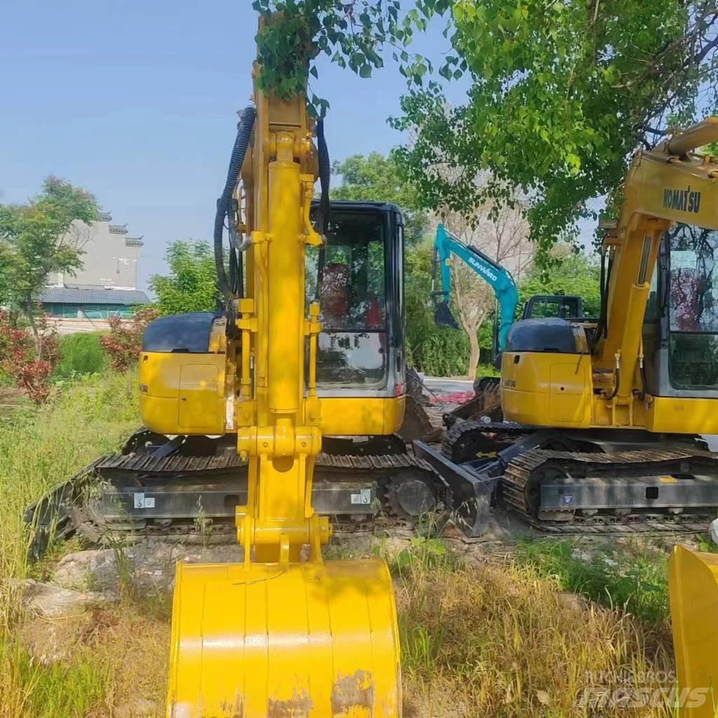 Komatsu PC 78 US Середні екскаватори 7т. - 12т.