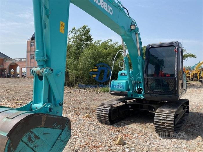 Kobelco SK 140 Гусеничні екскаватори