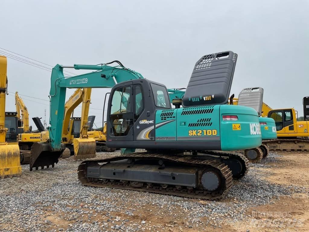 Kobelco SK 210 D Середні екскаватори 7т. - 12т.