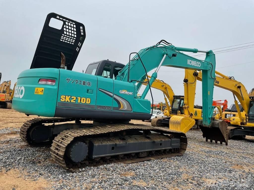 Kobelco SK 210 D Середні екскаватори 7т. - 12т.
