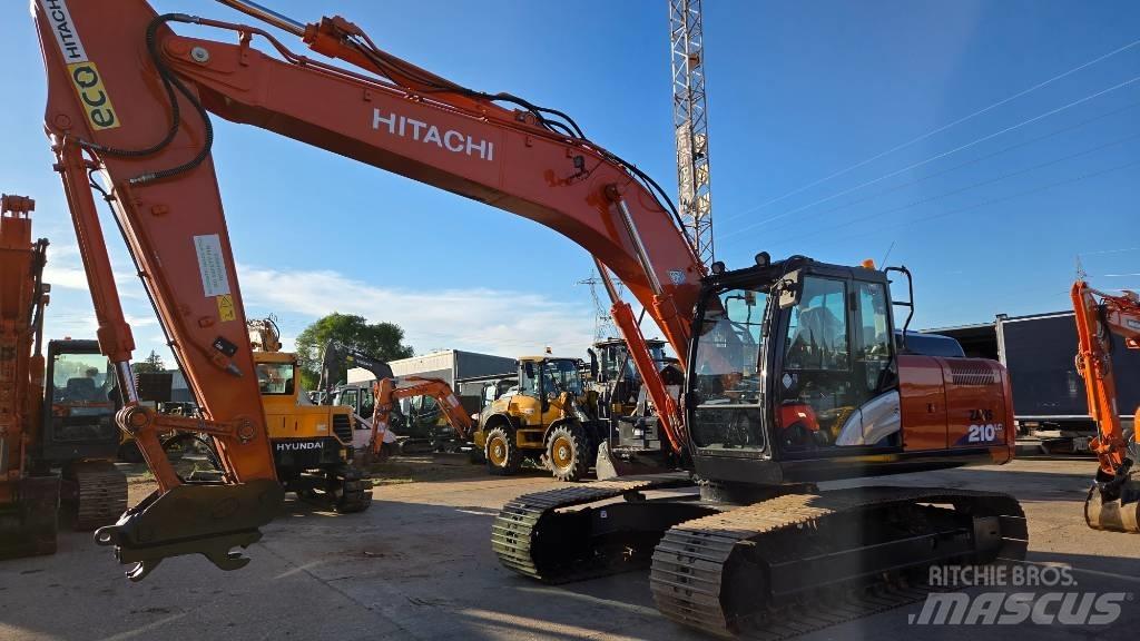 Hitachi ZX 210 Гусеничні екскаватори