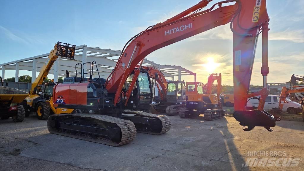Hitachi ZX 210 Гусеничні екскаватори