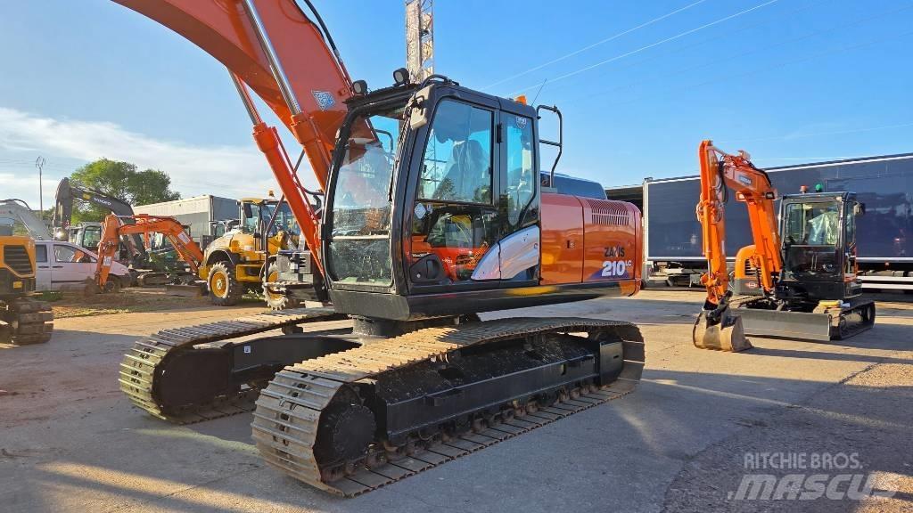 Hitachi ZX 210 Гусеничні екскаватори