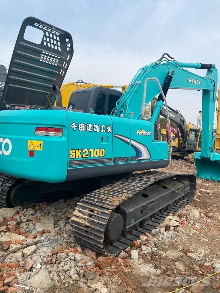 Kobelco 210 Гусеничні екскаватори