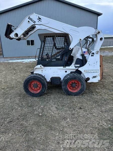 Bobcat S250 Міні-навантажувачі