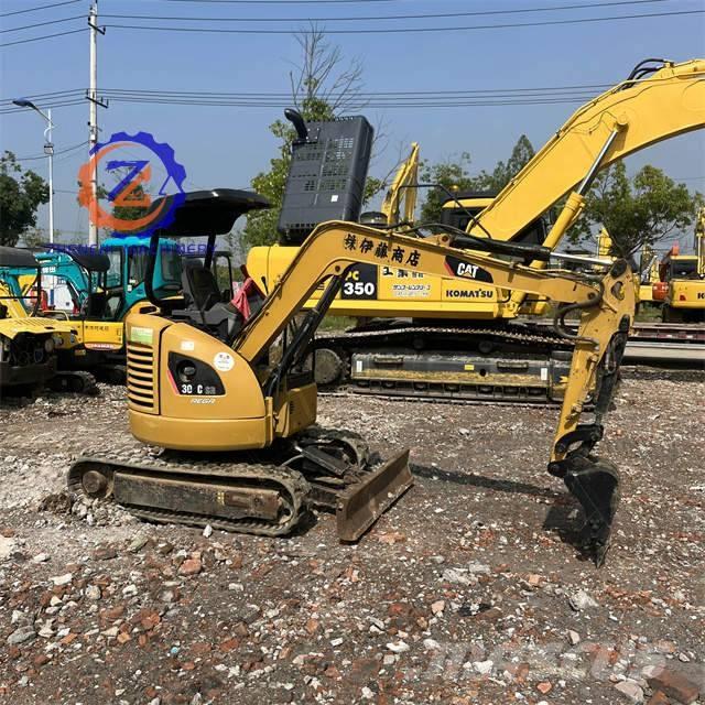 CAT 303 Міні-екскаватори < 7т
