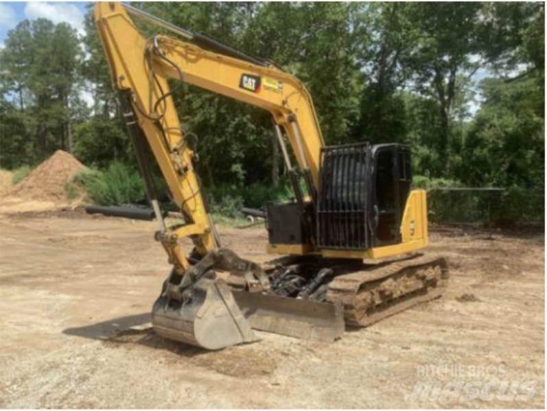 CAT 310 Гусеничні екскаватори