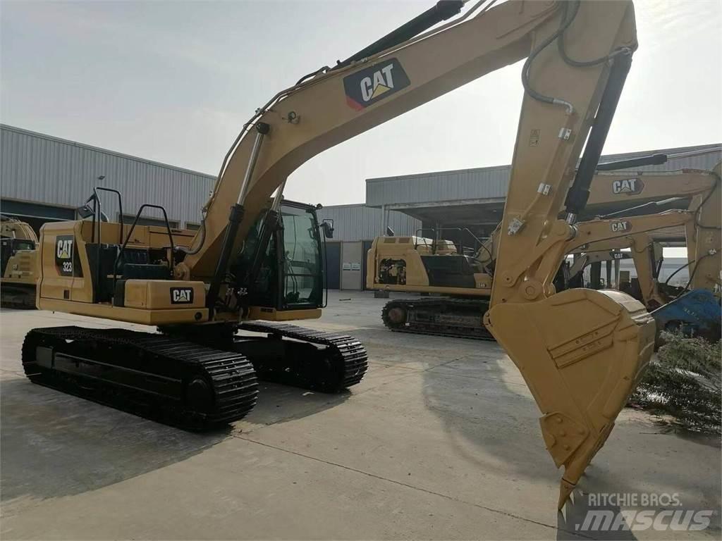 CAT 323 Гусеничні екскаватори