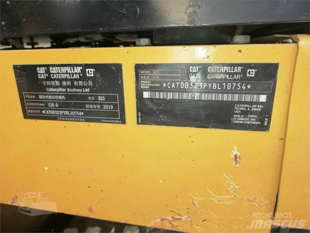 CAT 323 Гусеничні екскаватори
