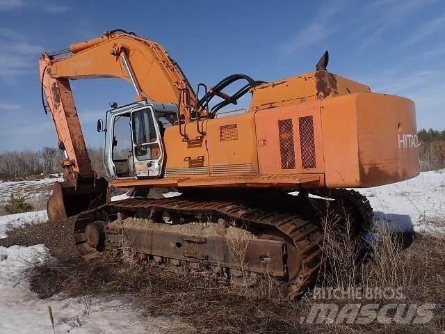 Hitachi EX700 Гусеничні екскаватори